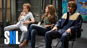 picture of three people sitting in chairs